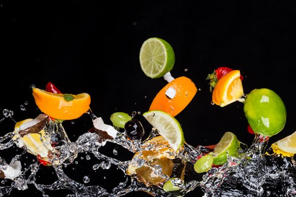 Fruit_Water_Spray_Black_background_521941_1280x653